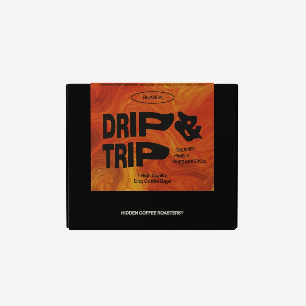 Caja negra de Hidden Coffee Roasters con etiqueta rosa "Drip & Trip" de Ruanda, pack de 7 bolsitas de café filtro drip.